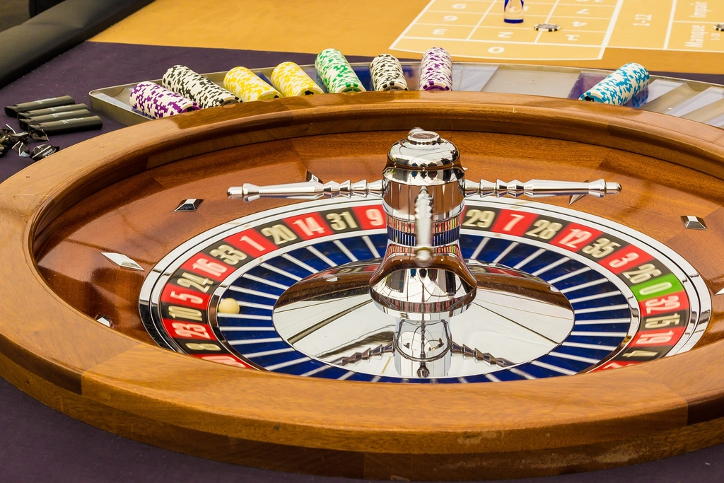 A roulette wheel on a casino table