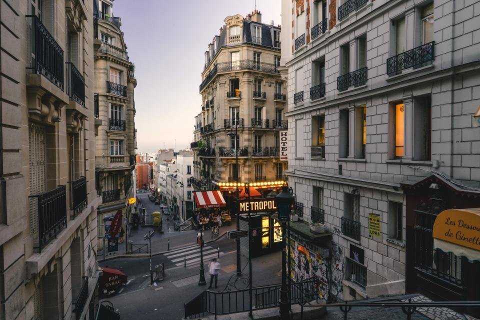 A busy city street at dusk