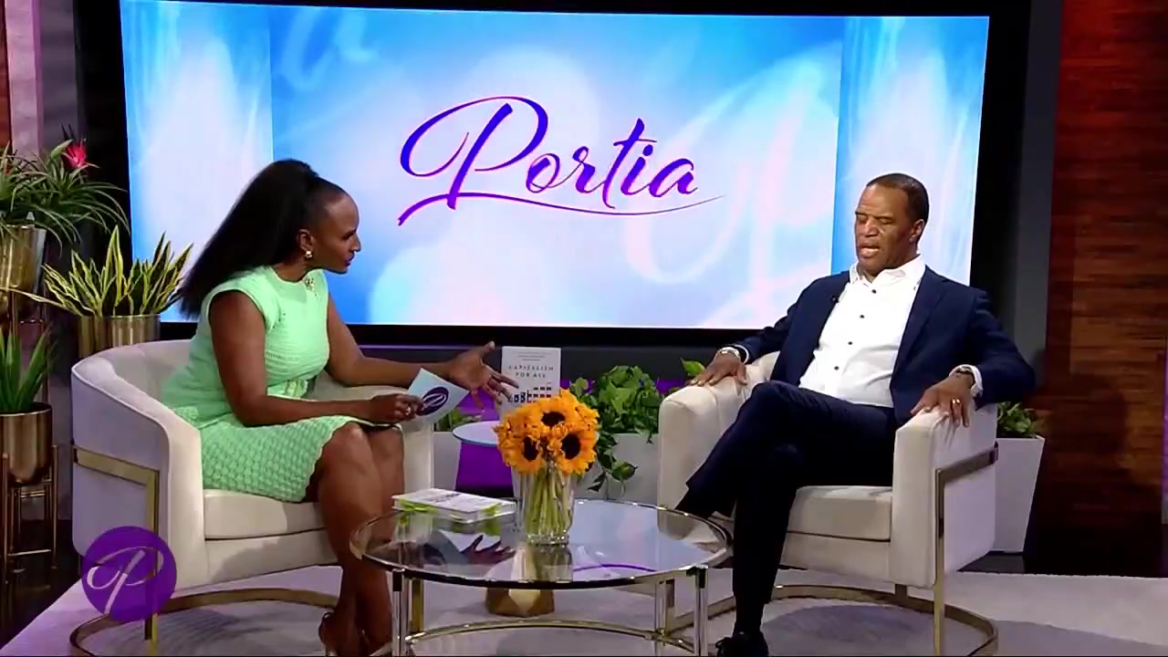 John Hope Bryant with host Portia on the set of Portia on FOX 5 Atlanta and Fox Soul